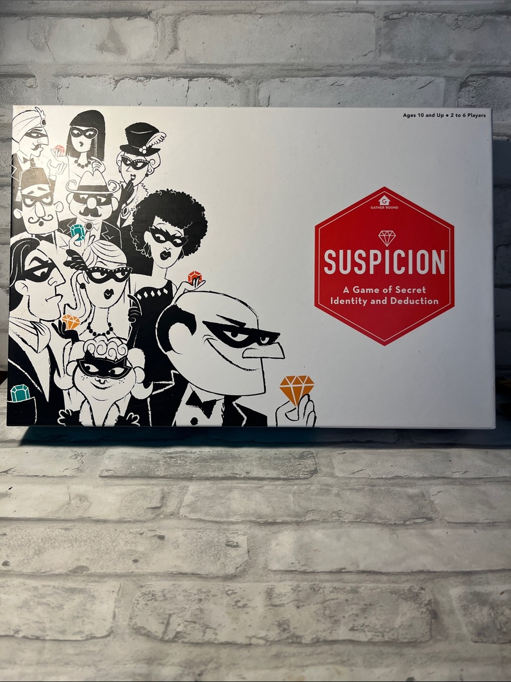 Suspicion board game secret identity and deduction ages 10+